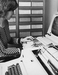 Student using computer, c. 1970s
